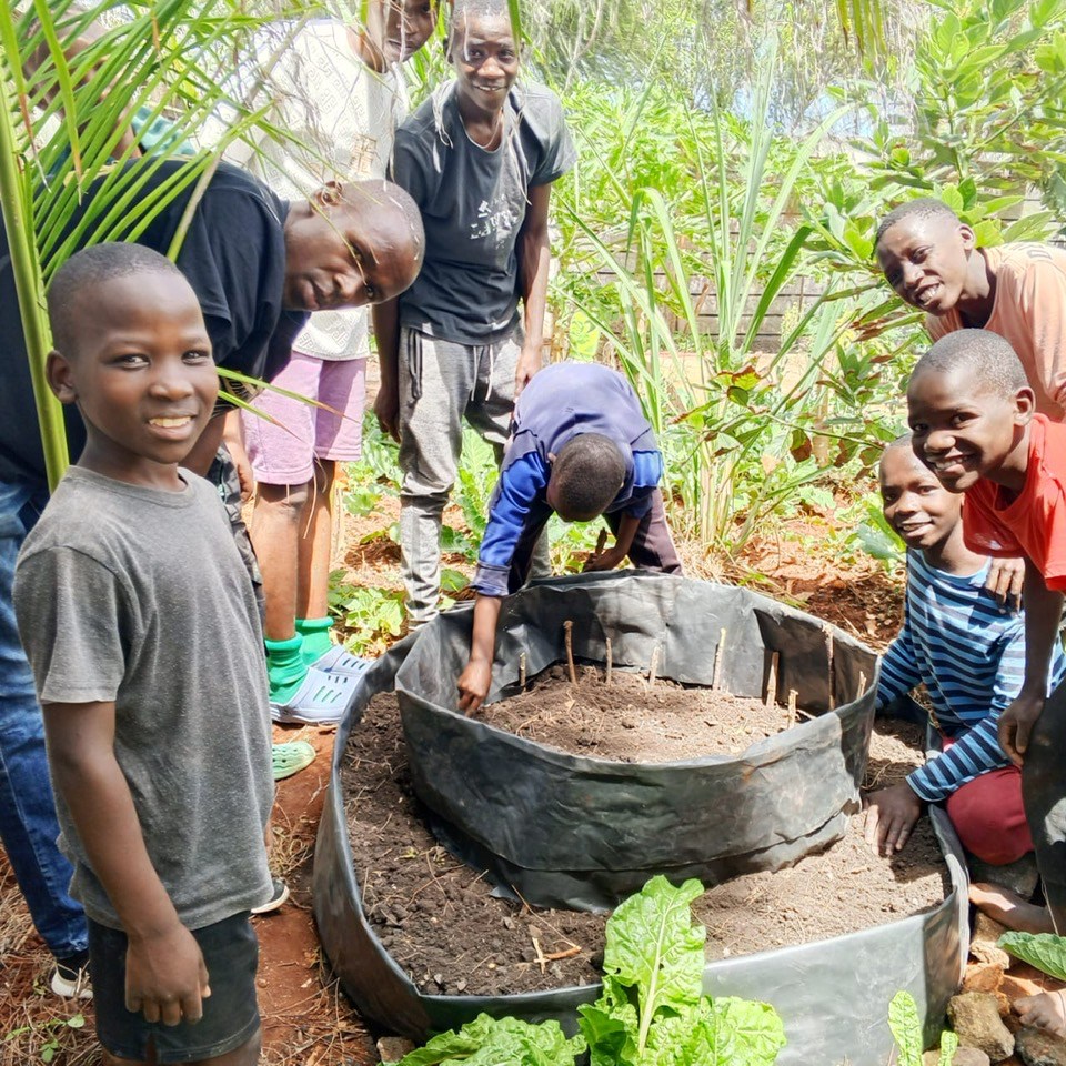 Boys working in the garden